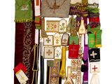 many different types of cloths laid out on a white surface