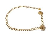 a close up of a gold chain bracelet with a star charm