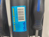 three different types of electrical tools are hanging on a wall