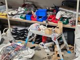 a cluttered garage with lots of clutter and tools
