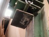 a picture of a machine that is working on a piece of metal