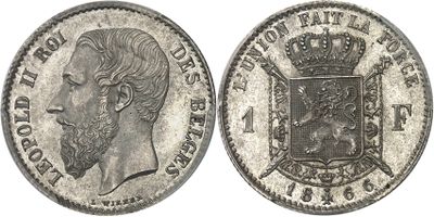 a close up of a coin with a crown on top of it