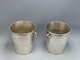 pair of silverplated ice buckets with handles and handles