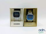 two casio watches in a box on a white surface
