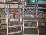 two ladders that are next to each other in a room