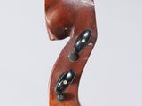a close up of a violin neck with the number 7 on it