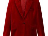 the jacket is red and has a black button on the lapel