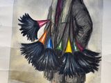 a drawing of a man with feathers on a piece of paper