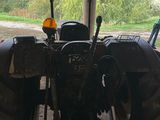 a tractor that is parked inside of a building
