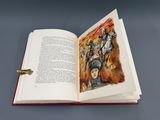 un livre ouvert avec l'image d'un homme sur un cheval