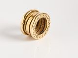 an 18k gold ring set with five rings