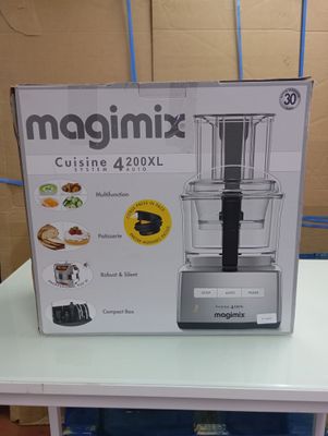 a box of food processor sitting on top of a table