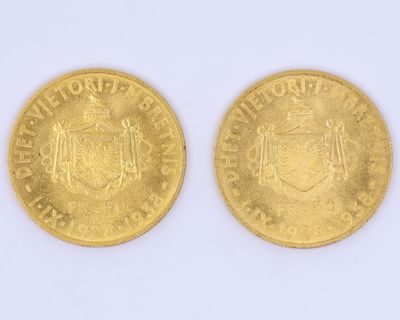 deux pièces d'or sur lesquelles figurent les armoiries de deux personnes