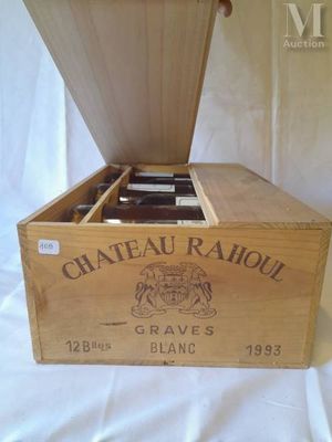 a wooden box with a bottle of wine inside of it