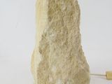 a large rock that is sitting on a white surface