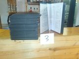 a picture of a restaurant counter with a menu and wine glasses on it