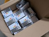 a cardboard box full of electronic equipment in a warehouse