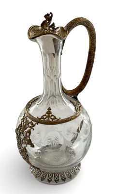 AIGUIERE en cristal taillé de rinceaux et d'étoiles stylisée…