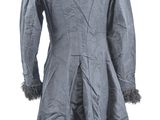 an image of a coat on a mannequin stand