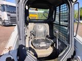 an image of a small vehicle with a seat in the back