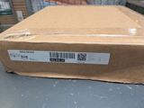 a box that is sitting on a table in a warehouse