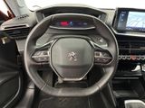 the interior of a car with a steering wheel, dashboard, and dash board