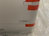 a printer that is sitting on a plastic bag