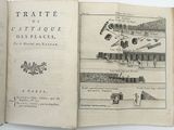an open book with a drawing of a train on it