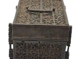 a small wooden box with a cross on it