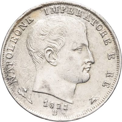 une vieille pièce d'argent sur laquelle figure le portrait d'un homme