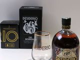 a bottle of liquor and a glass next to a box