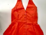 a red dress with a collared top on a mannequin