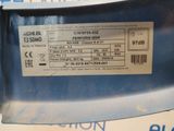 a label on the back of a blue car