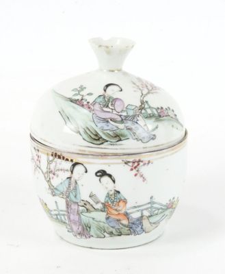 a white bowl with a lid that has a painting on it
