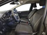 the interior of a car with a steering wheel and a dashboard