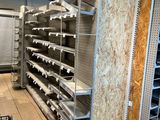 many shelves in the store that are empty of items