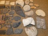 many different types of rocks and stones on the floor