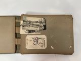 an old photo of a book with a picture of a train on it