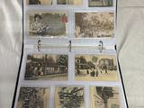 many old photos in a case on a bed