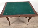 an image of a table with a green cloth on it