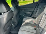 the back seats of a car are empty in the back of the car