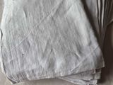 a stack of folded napkins on a table