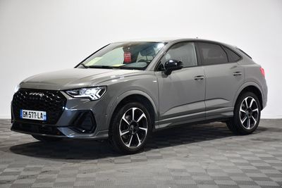a grey 2020 hyundai kole suv parked on a checkered floor