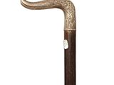 an image of a walking stick with a carved handle