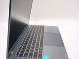 a laptop computer that is sitting on a table