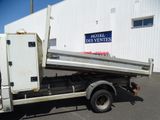 a white truck that is parked in front of a building