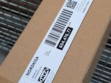 a box with a barcode on it sitting on a carton