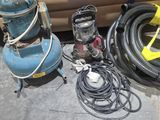 many different types of industrial equipment sitting on the ground