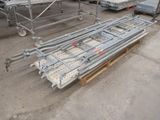 a lot of scaffolding on the ground in a warehouse