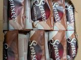 a box of chocolate bars that are in a cardboard box